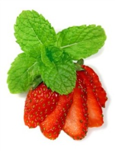 Fresh sliced strawberries with mint.